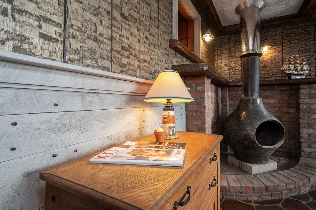 37 Pine Point Road Duxbury, MA 02332 - Photo 6 of 24 a bathroom with a sink and mirror