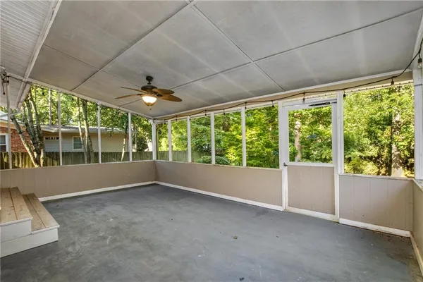 a view of room with a large window