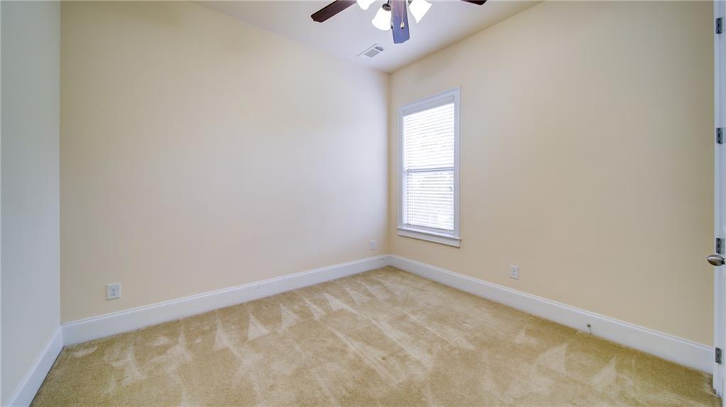 2220 Stirling Bridge Road Cumming, GA 30041 - Photo 31 of 82 an empty room with a window