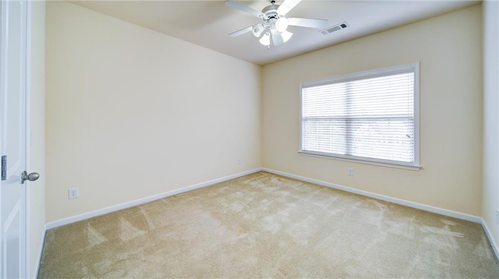 2220 Stirling Bridge Road Cumming, GA 30041 - Photo 37 of 82 an empty room with a window