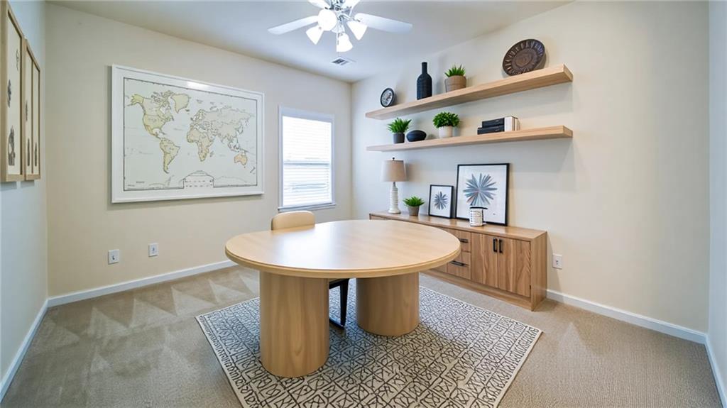 2220 Stirling Bridge Road Cumming, GA 30041 - Photo 48 of 82 a dining room with furniture and window