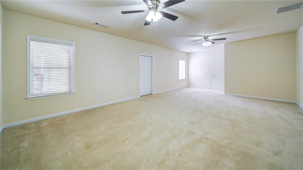 2220 Stirling Bridge Road Cumming, GA 30041 - Photo 62 of 82 a view of an empty room with a window