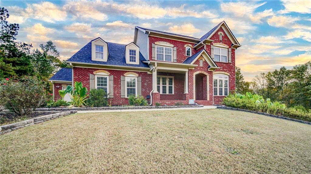 2220 Stirling Bridge Road Cumming, GA 30041 - Photo 72 of 82 a front view of a house with yard
