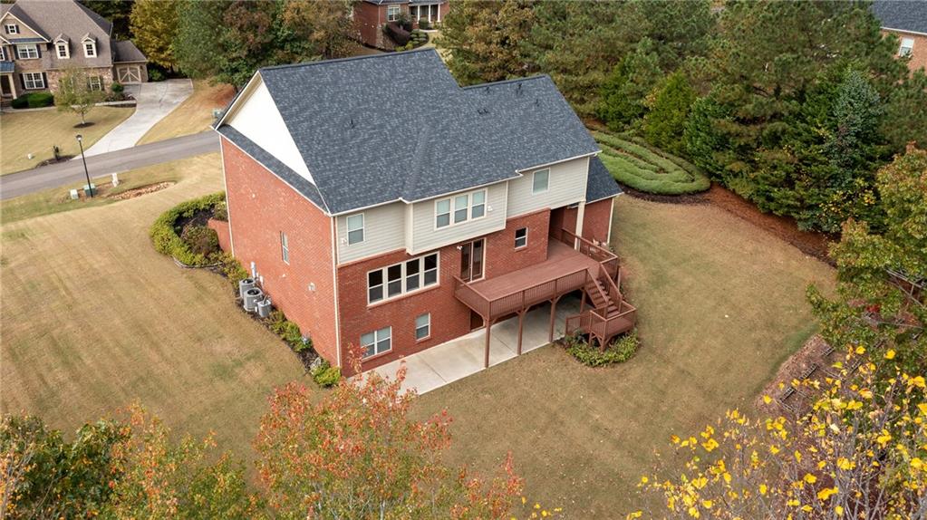 2220 Stirling Bridge Road Cumming, GA 30041 - Photo 77 of 82 an aerial view of a house with yard and sitting area