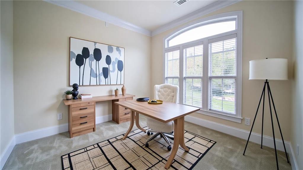 2220 Stirling Bridge Road Cumming, GA 30041 - Photo 8 of 82 a view of a workspace with furniture and a window