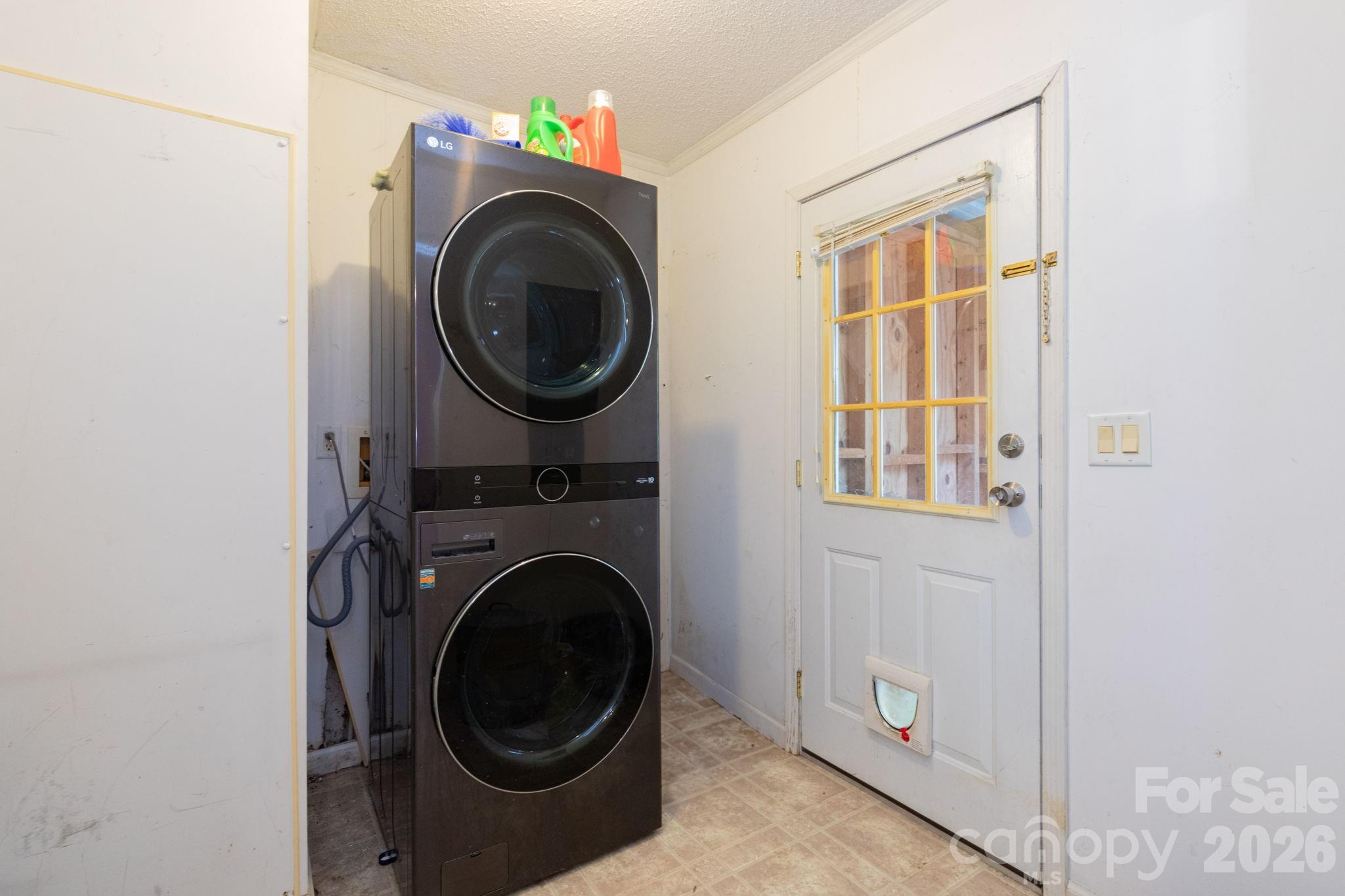 16 Rusty Clay Ridge Fairview, NC 28730 - Photo 16 of 19 a utility room with dryer and washer