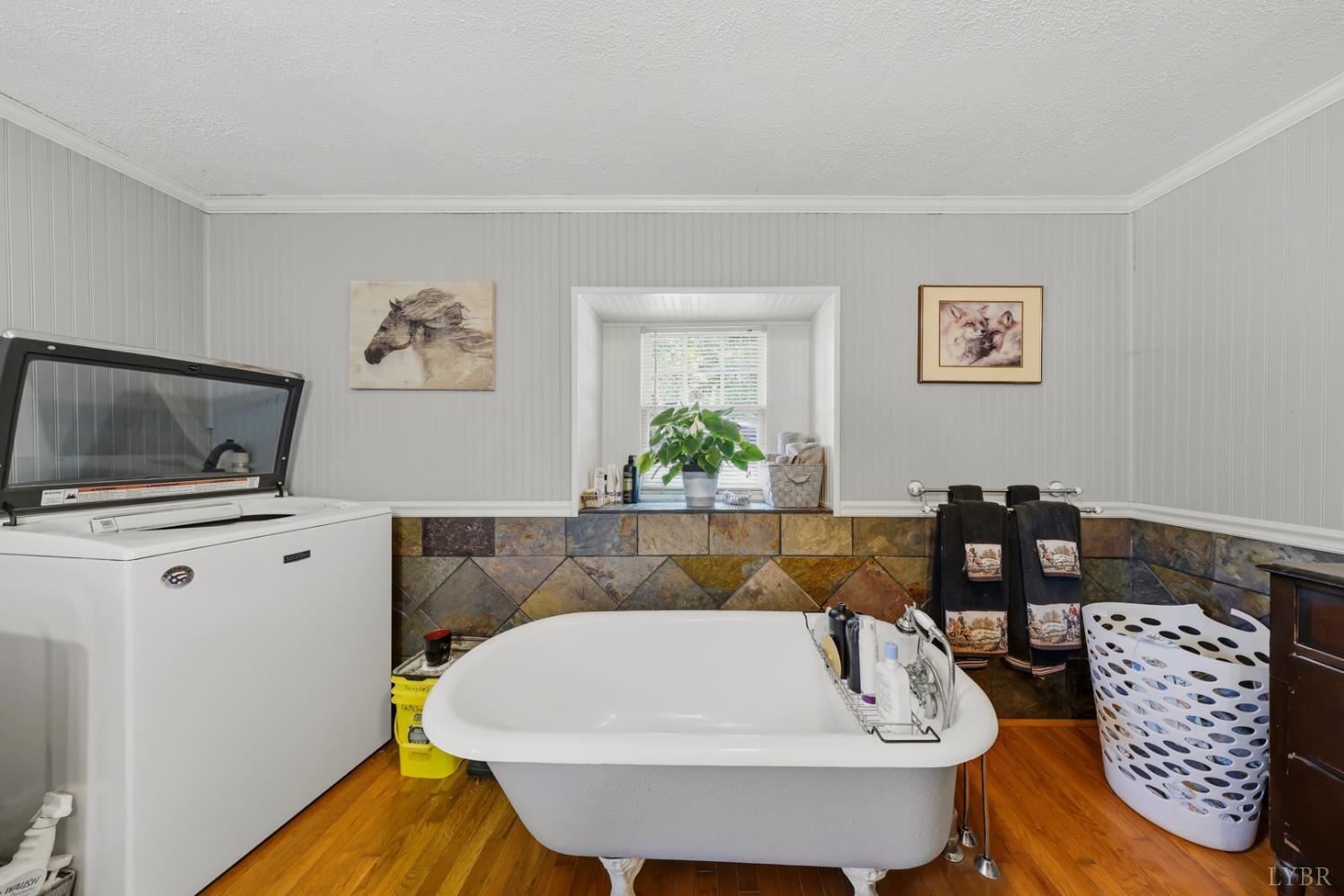 809 Plantation Road Amherst, VA 24521 - Photo 15 of 77 a living room with furniture and a flat screen tv