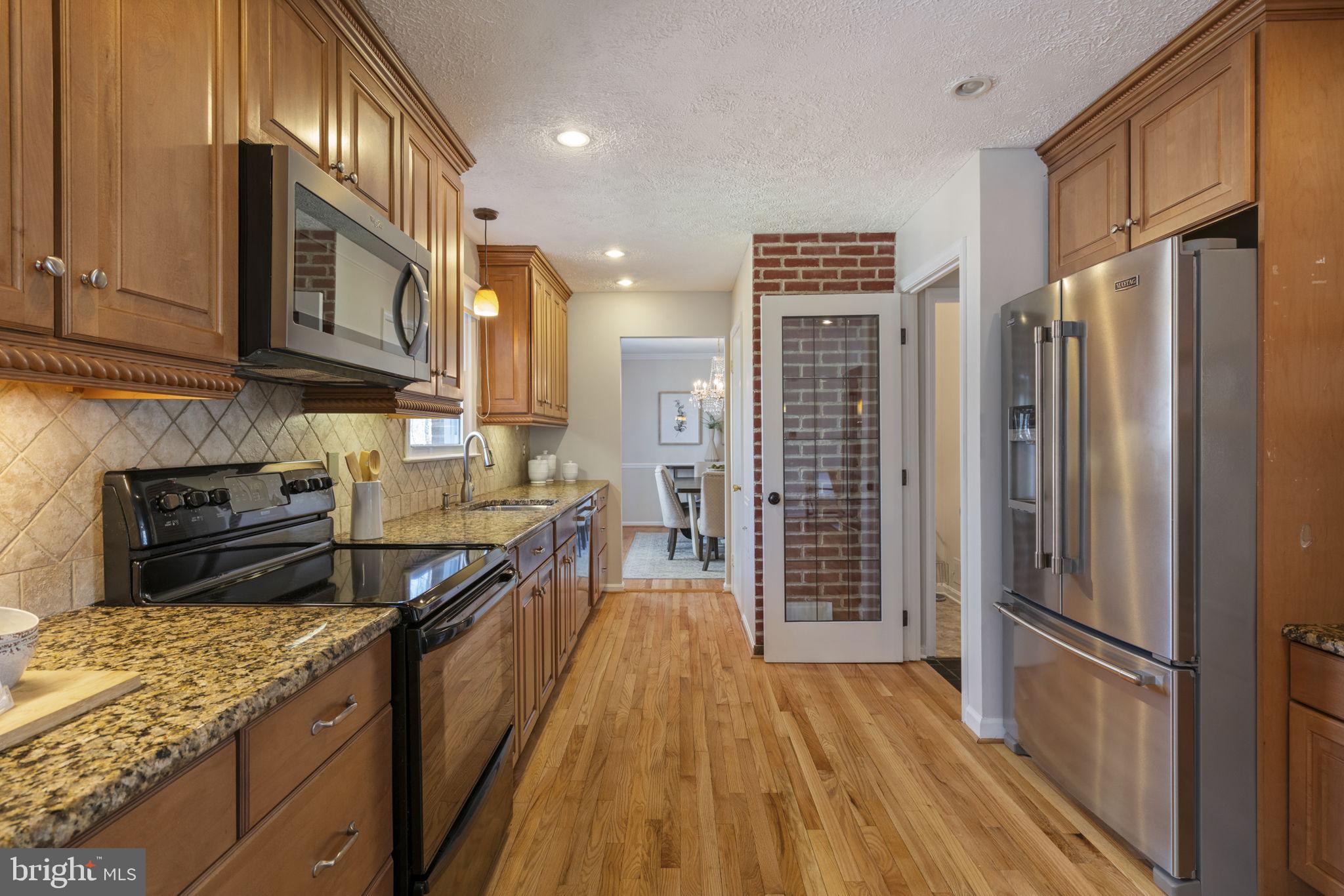 7102 Bear Court Springfield, VA 22153 - Photo 16 of 65 Kitchen with Stainless Steel Appliances
