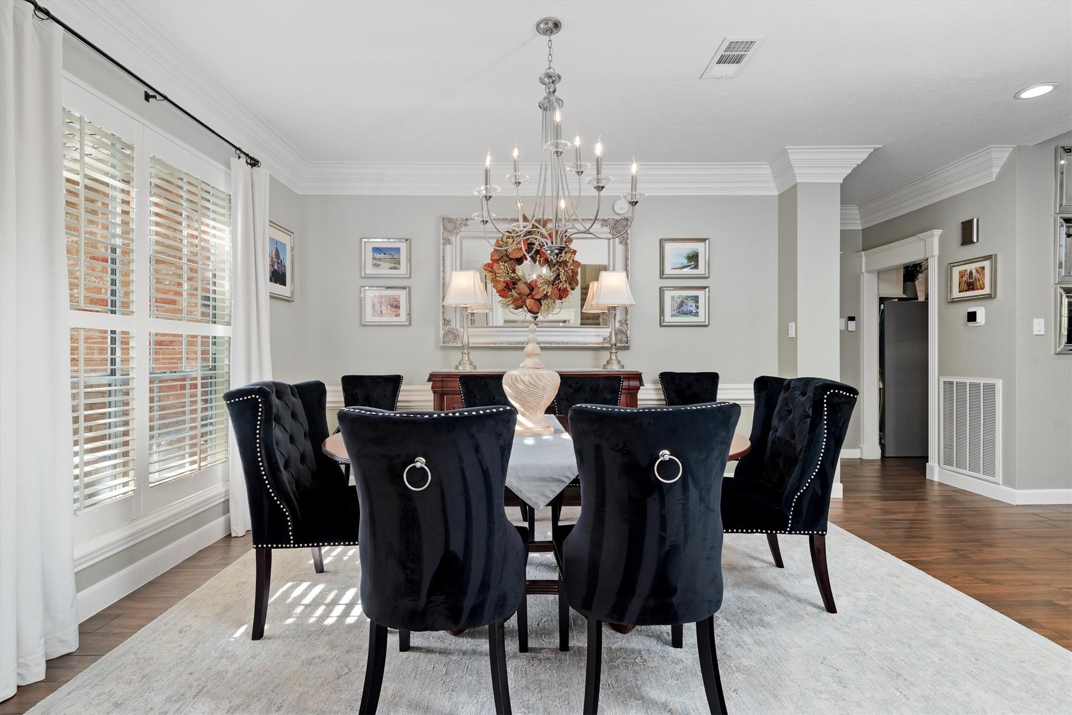 16022 Stewarts Grove Drive Spring, TX 77379 - Photo 10 of 45 a view of a dining room with furniture window and wooden floor