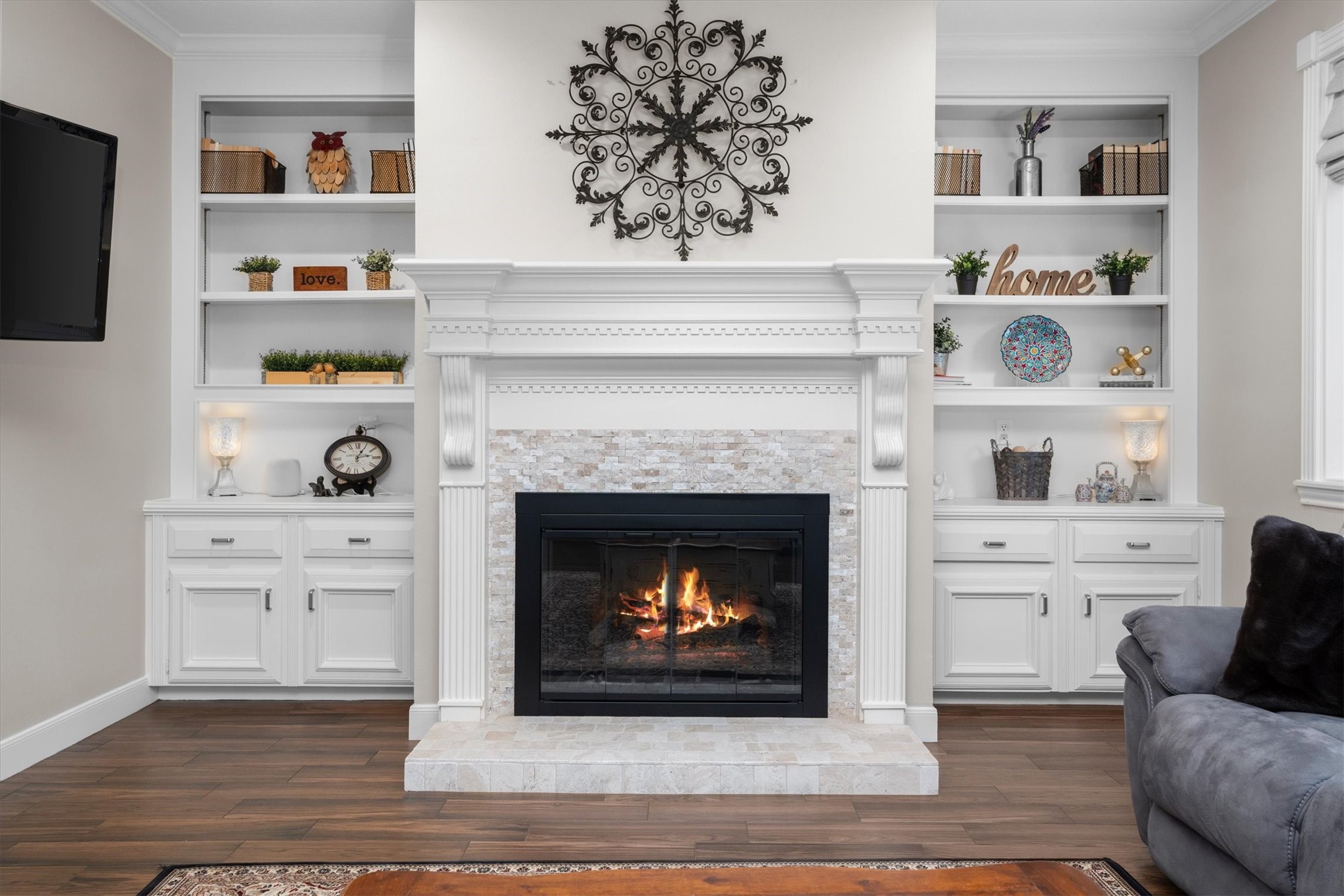 16022 Stewarts Grove Drive Spring, TX 77379 - Photo 21 of 45 FAMILY ROOM: A closer view of the beautiful custom fireplace, mantel and custom wood cabinetry.