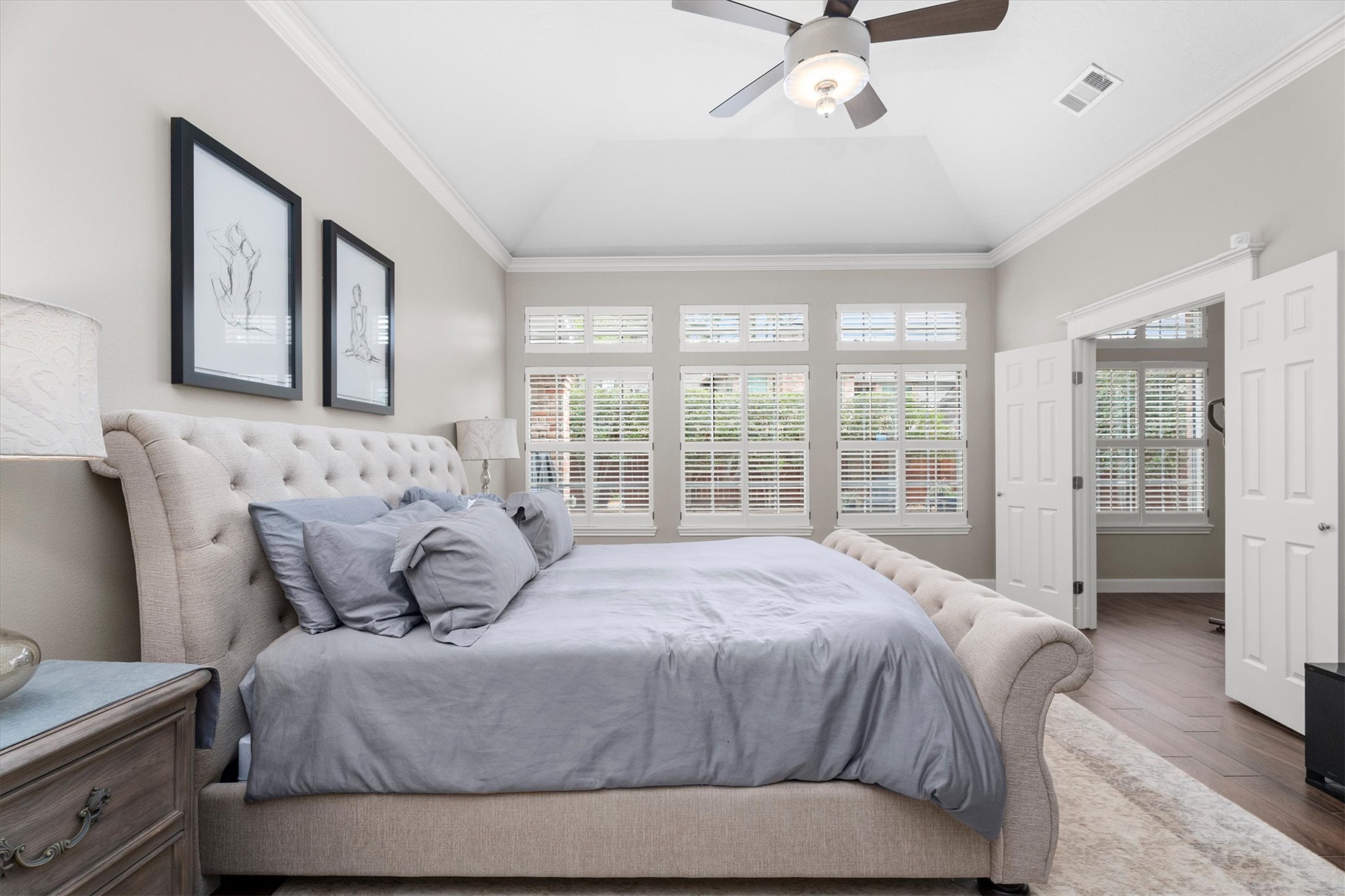 16022 Stewarts Grove Drive Spring, TX 77379 - Photo 23 of 45 a bedroom with a large bed and a window