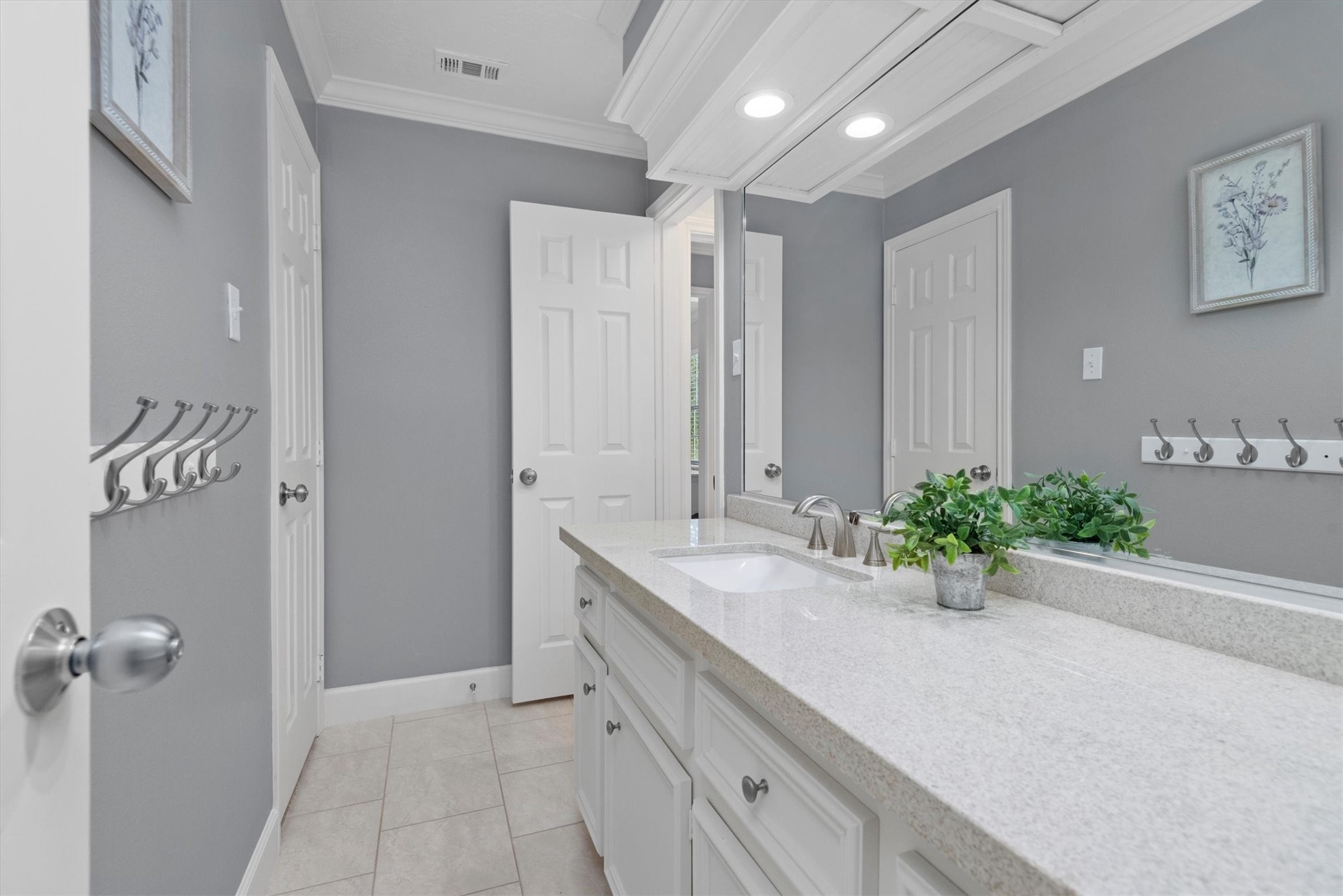 16022 Stewarts Grove Drive Spring, TX 77379 - Photo 30 of 45 a spacious bathroom with a sink and a mirror