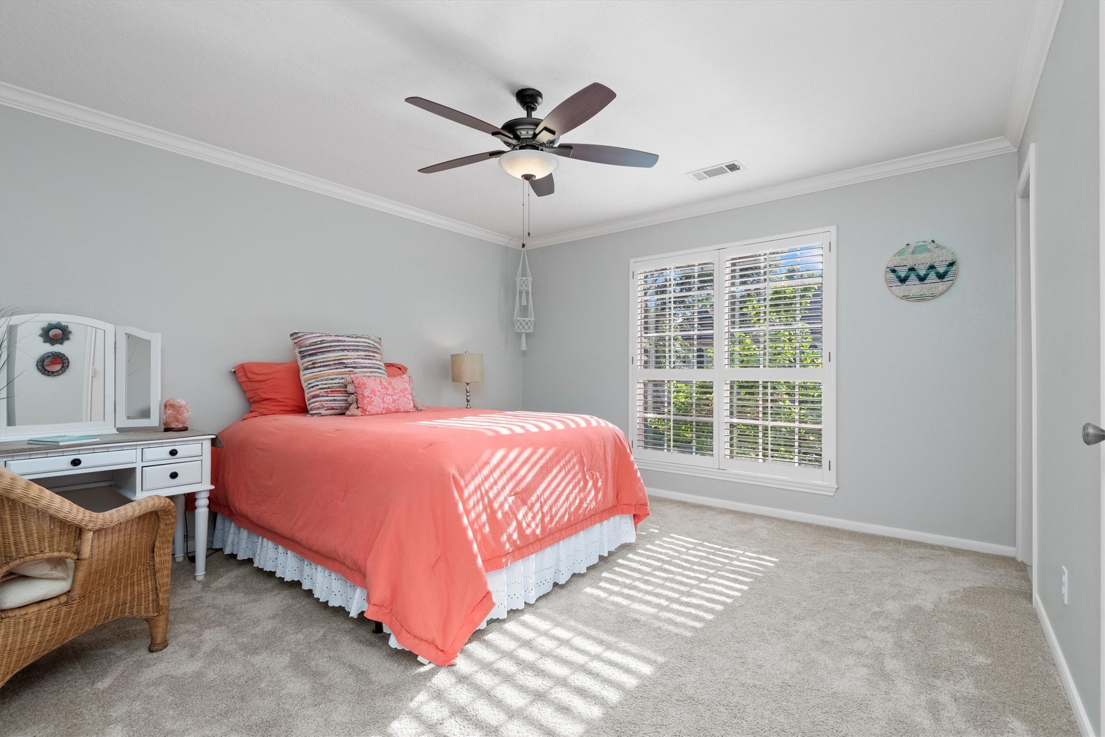 16022 Stewarts Grove Drive Spring, TX 77379 - Photo 33 of 45 a bedroom with a large bed and a window