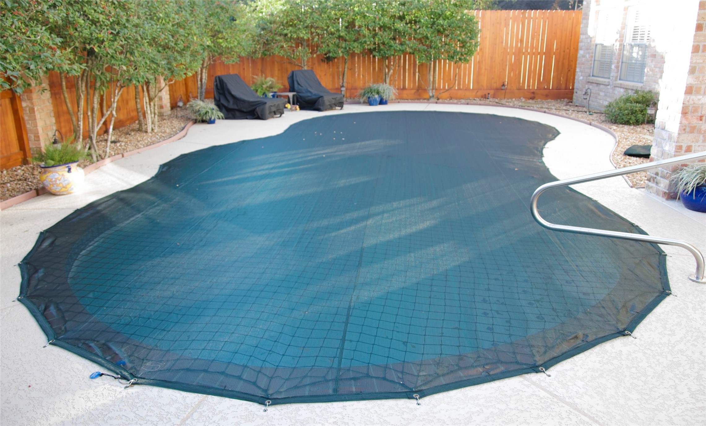16022 Stewarts Grove Drive Spring, TX 77379 - Photo 39 of 45 To ensure the safety of children, a custom Katcha-a-Kid safety net was installed. Additionally, a custom leaf collection net was added to simplify maintenance during the Autumn and Spring.
