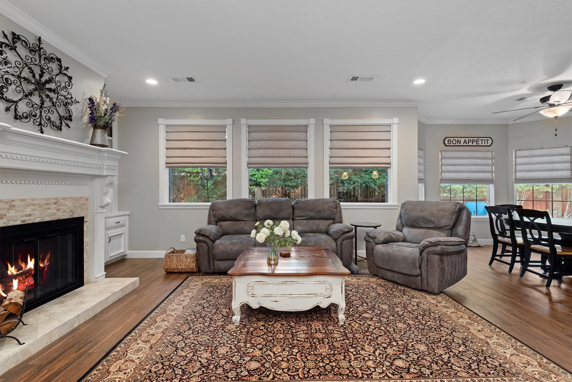 16022 Stewarts Grove Drive Spring, TX 77379 - Photo 3 of 45 a living room with furniture and a fireplace
