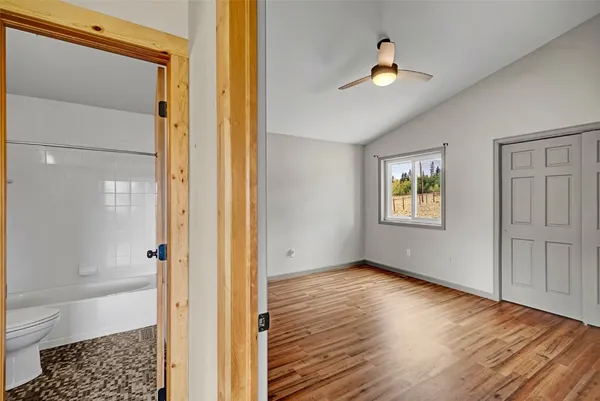 a view of an entryway of the house and wooden floor