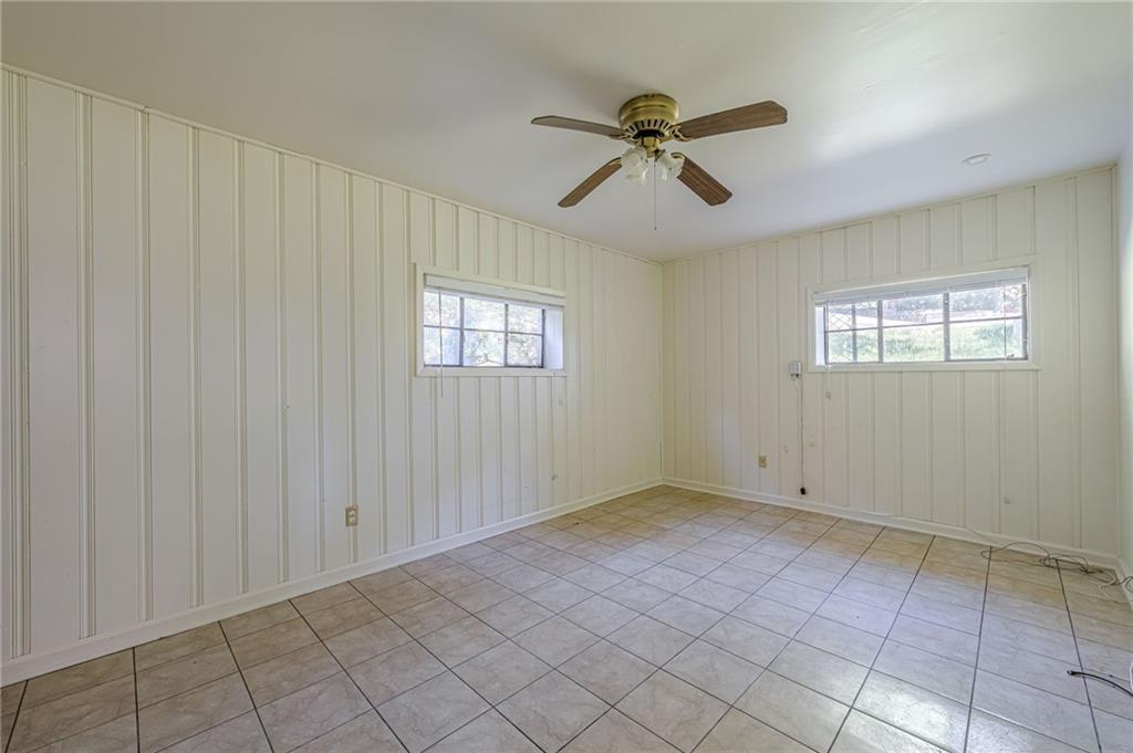 1502 North Druid Hills Road Brookhaven, GA 30319 - Photo 25 of 46 a view of an empty room with a window