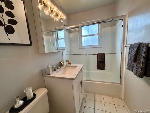 111 College Road, Unit 15C Selden, NY 11784 - Photo 9 of 10 a bathroom with a sink toilet and shower