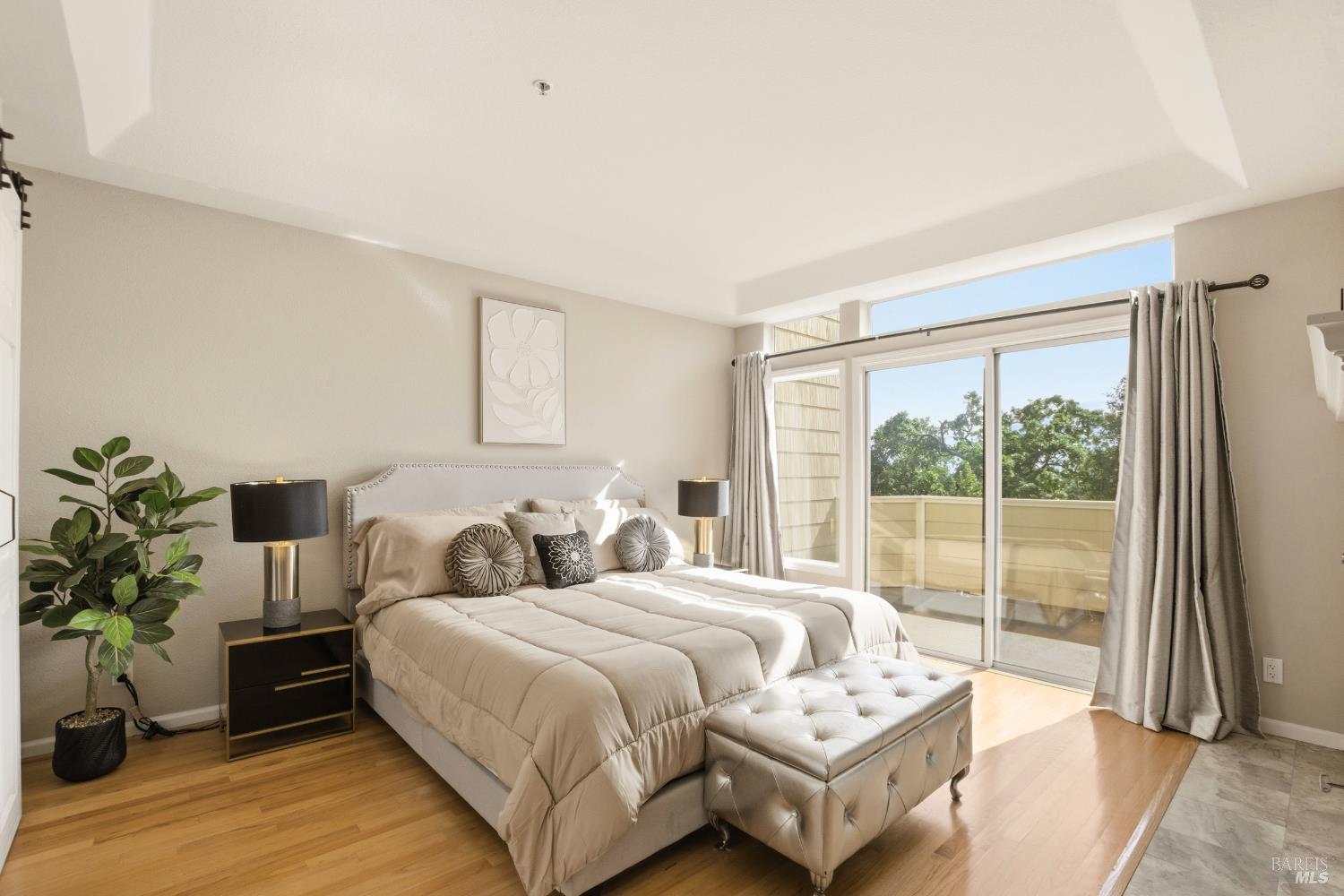 2003 Stonefield Lane Santa Rosa, CA 95403 - Photo 18 of 25 a bedroom with a bed and a large window