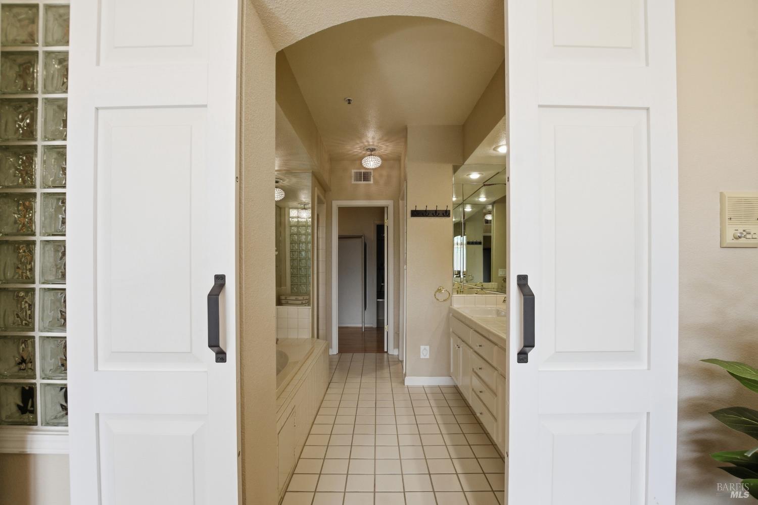 2003 Stonefield Lane Santa Rosa, CA 95403 - Photo 20 of 25 a bathroom with a sink and a mirror