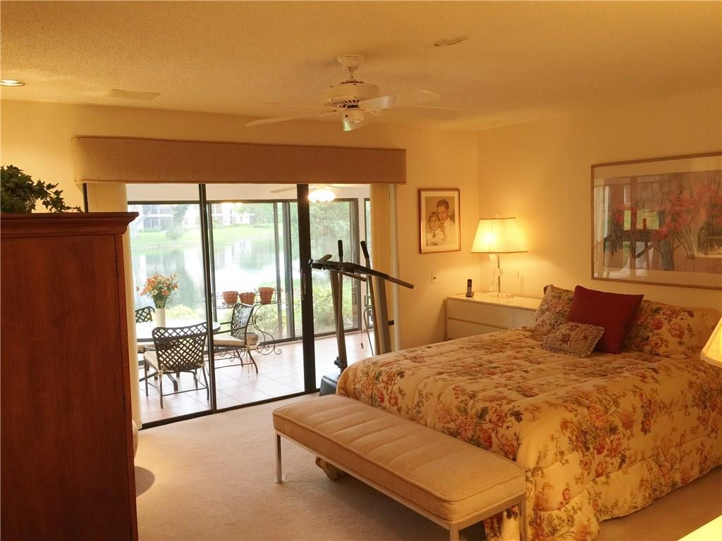 21925 Arriba Real, Unit 19A Boca Raton, FL 33433 - Photo 13 of 35 Master Bedroom with Lake View
