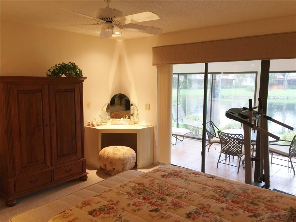 21925 Arriba Real, Unit 19A Boca Raton, FL 33433 - Photo 18 of 35 Master Bedroom facing Lanai & Lake