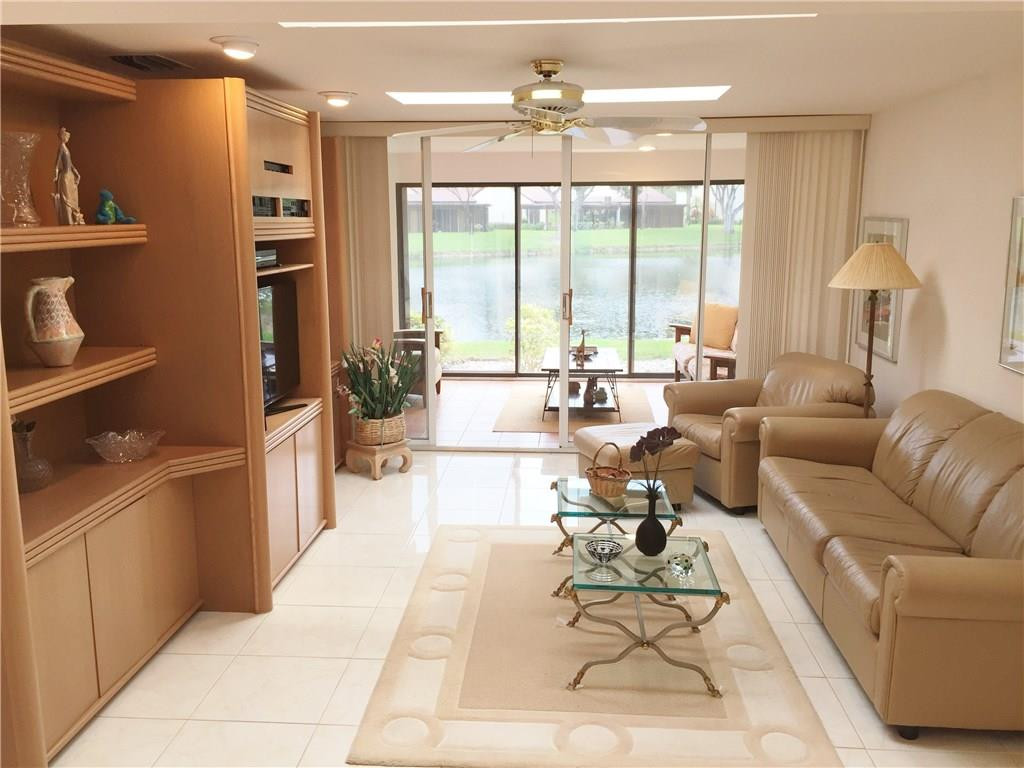 21925 Arriba Real, Unit 19A Boca Raton, FL 33433 - Photo 8 of 35 Spacious Family Room with Sky Lights