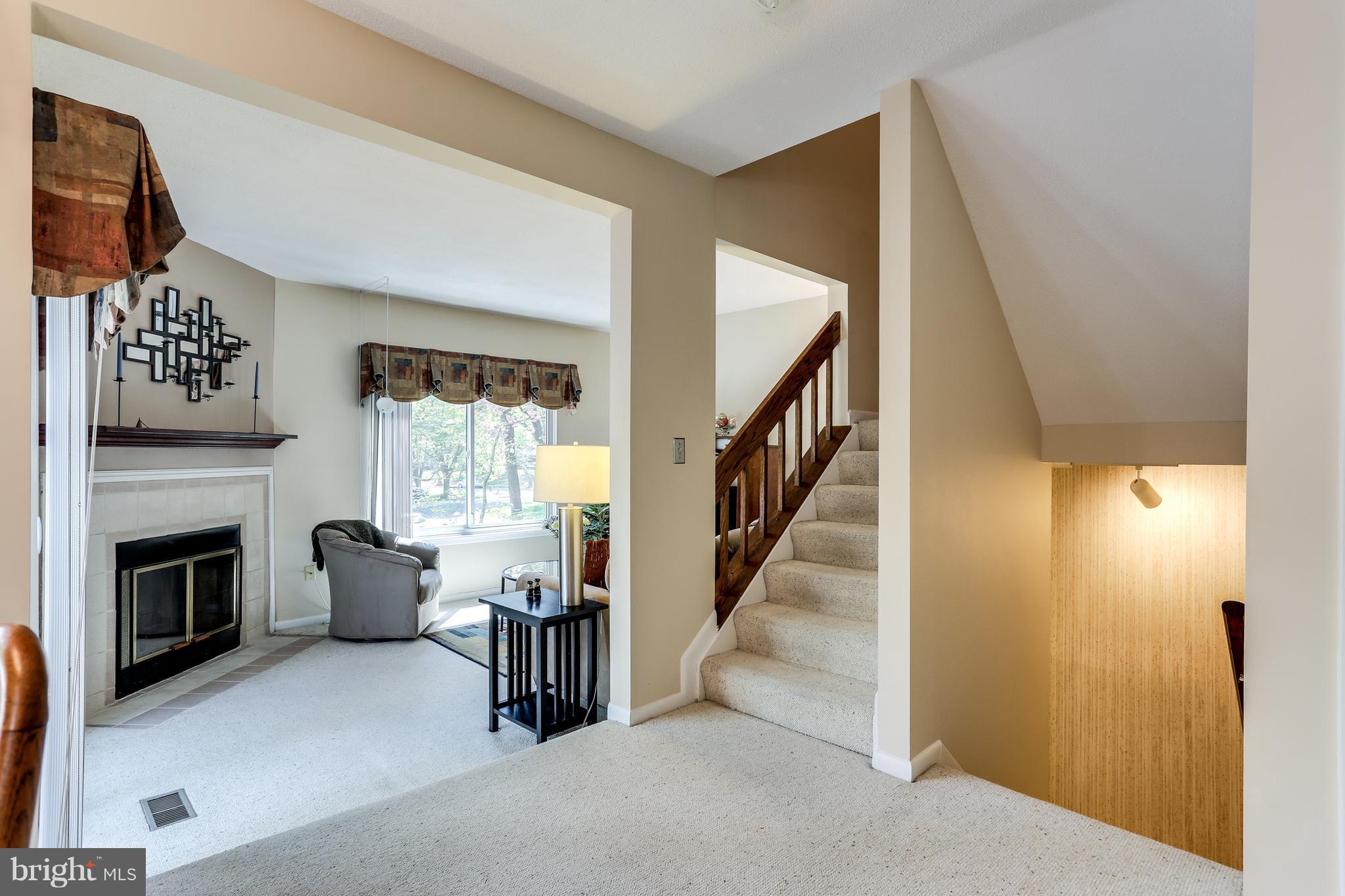 5431 Vantage Point Road Columbia, MD 21044 - Photo 13 of 29 a view of entryway and hall with wooden floor