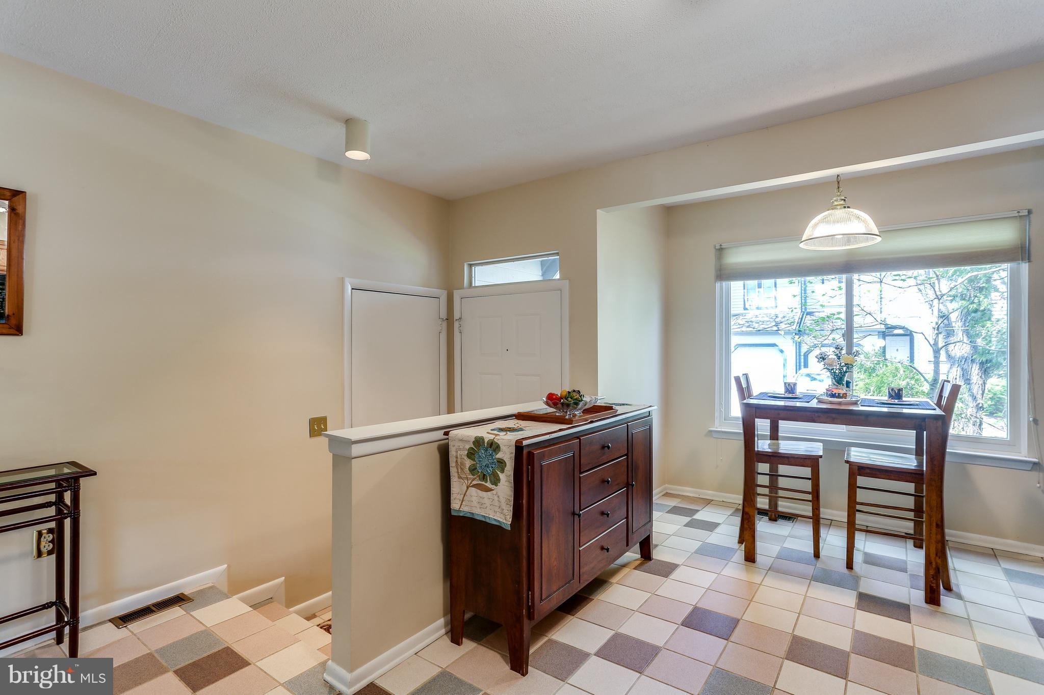 5431 Vantage Point Road Columbia, MD 21044 - Photo 5 of 29 a living room with a couch and a table