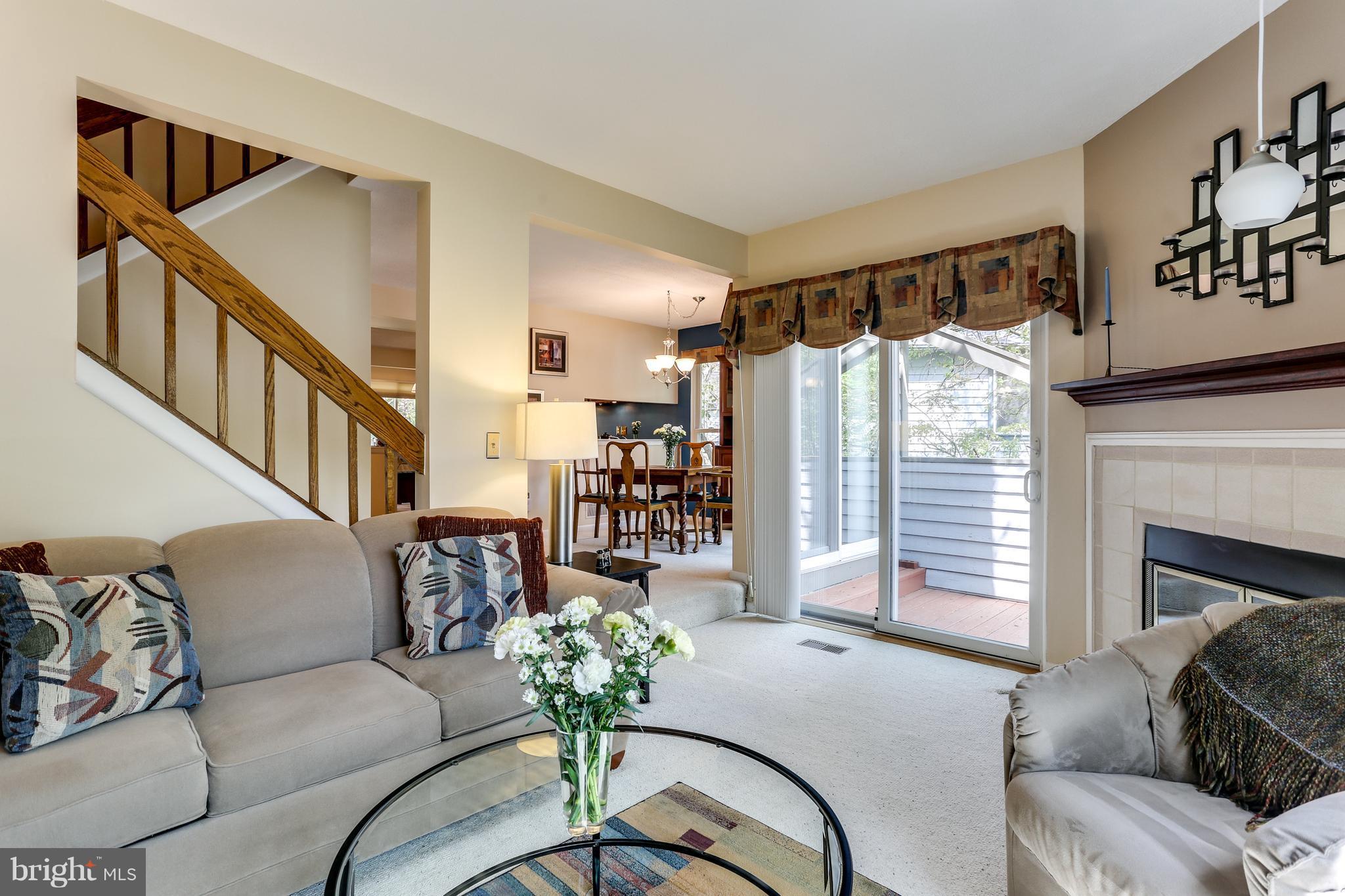 5431 Vantage Point Road Columbia, MD 21044 - Photo 10 of 29 a living room with furniture and a fireplace