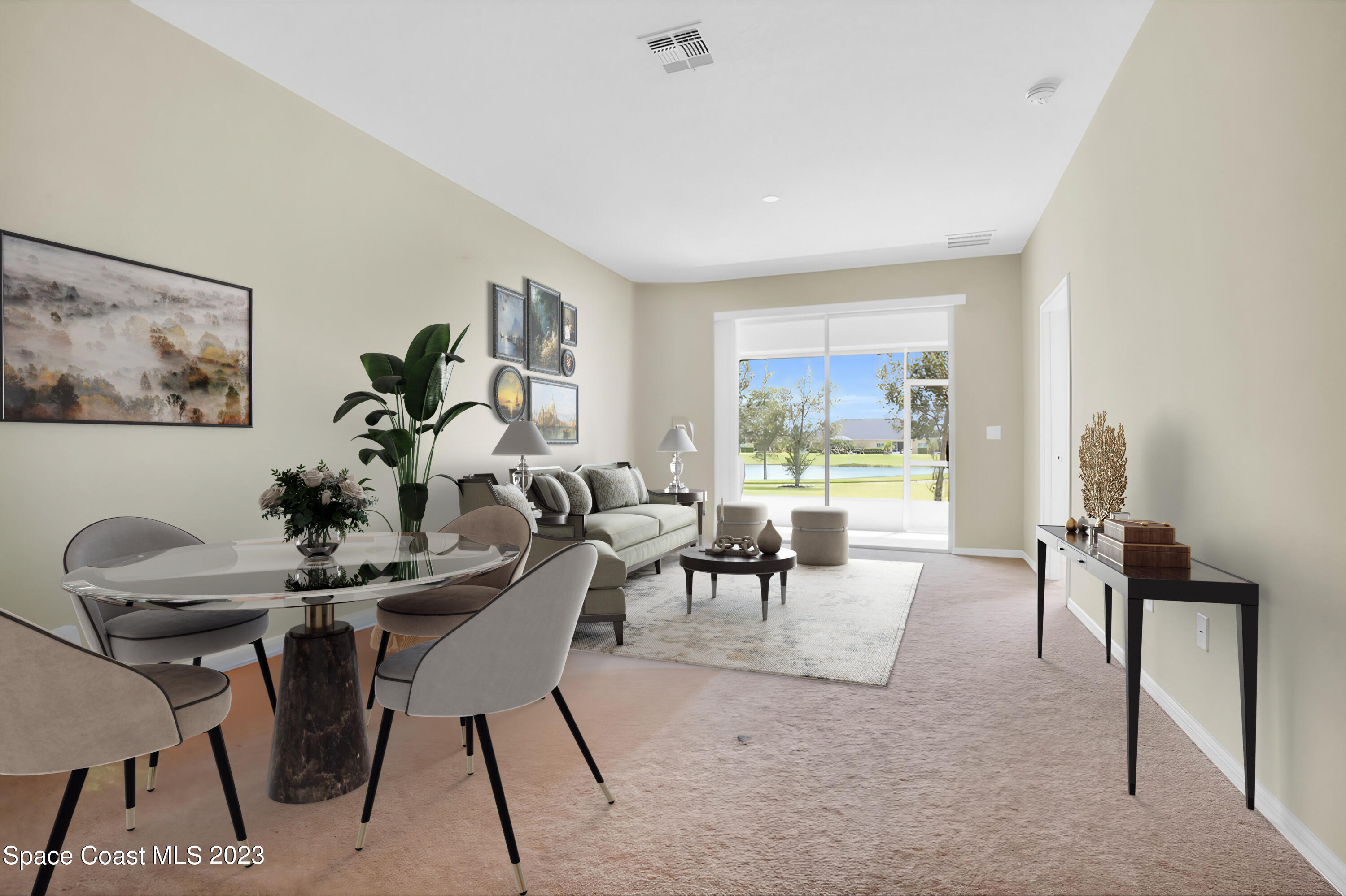 5928 Van Ness Drive Melbourne, FL 32940 - Photo 11 of 35 a view of a livingroom and a dining room with furniture window and outside view
