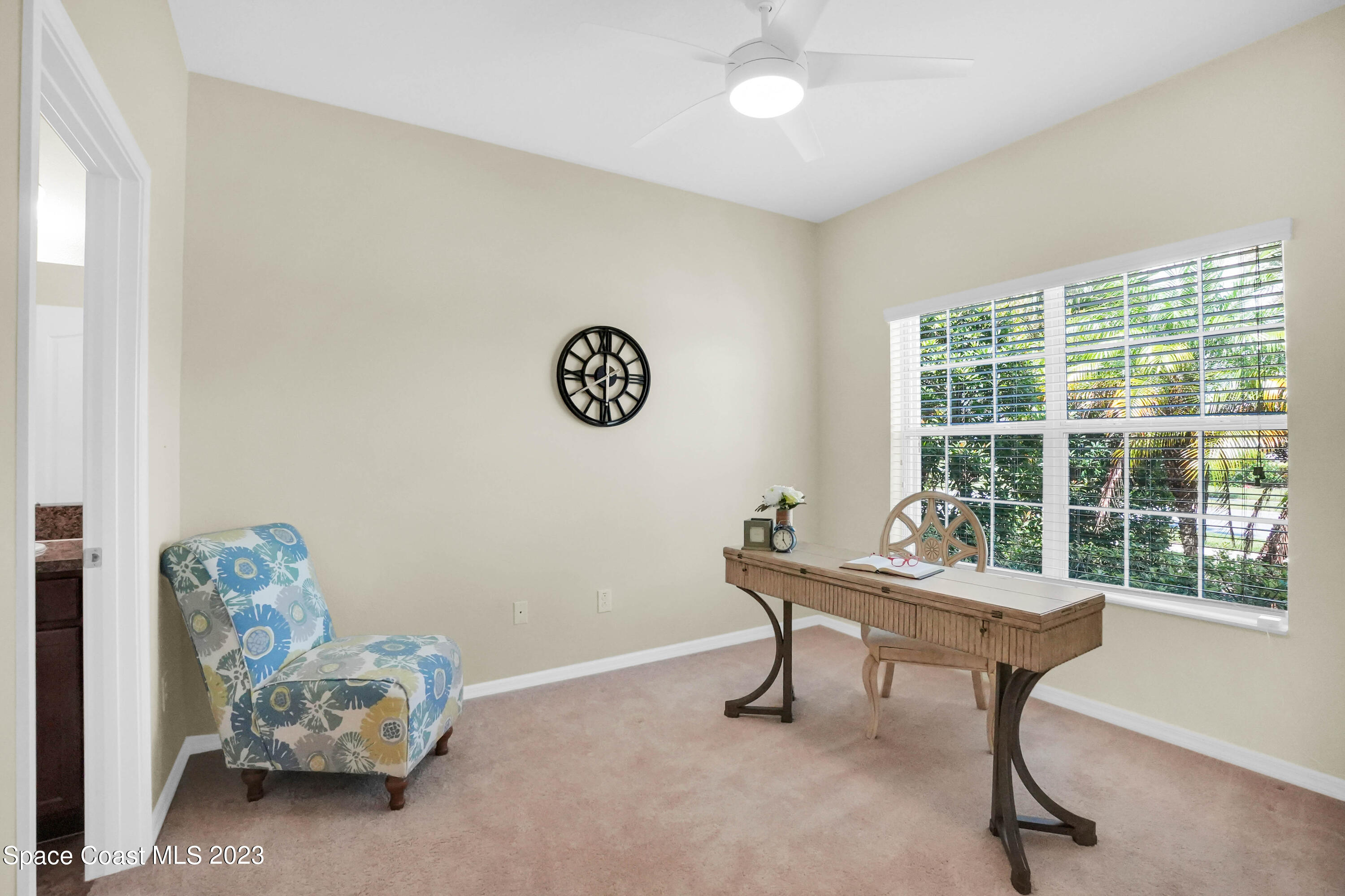 5928 Van Ness Drive Melbourne, FL 32940 - Photo 16 of 35 a room with furniture and a window