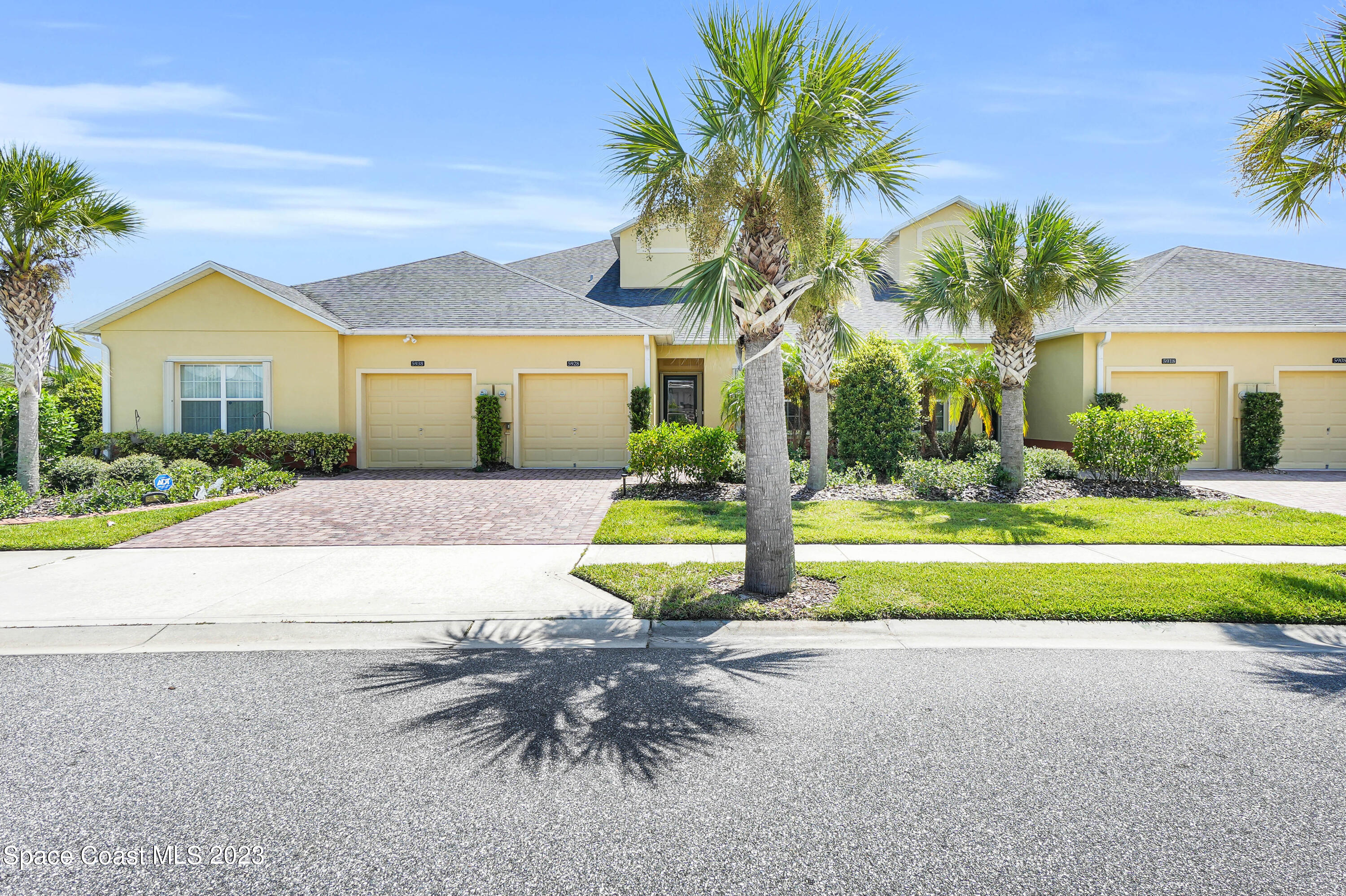 5928 Van Ness Drive Melbourne, FL 32940 - Photo 24 of 35 a view of house with yard and palm trees