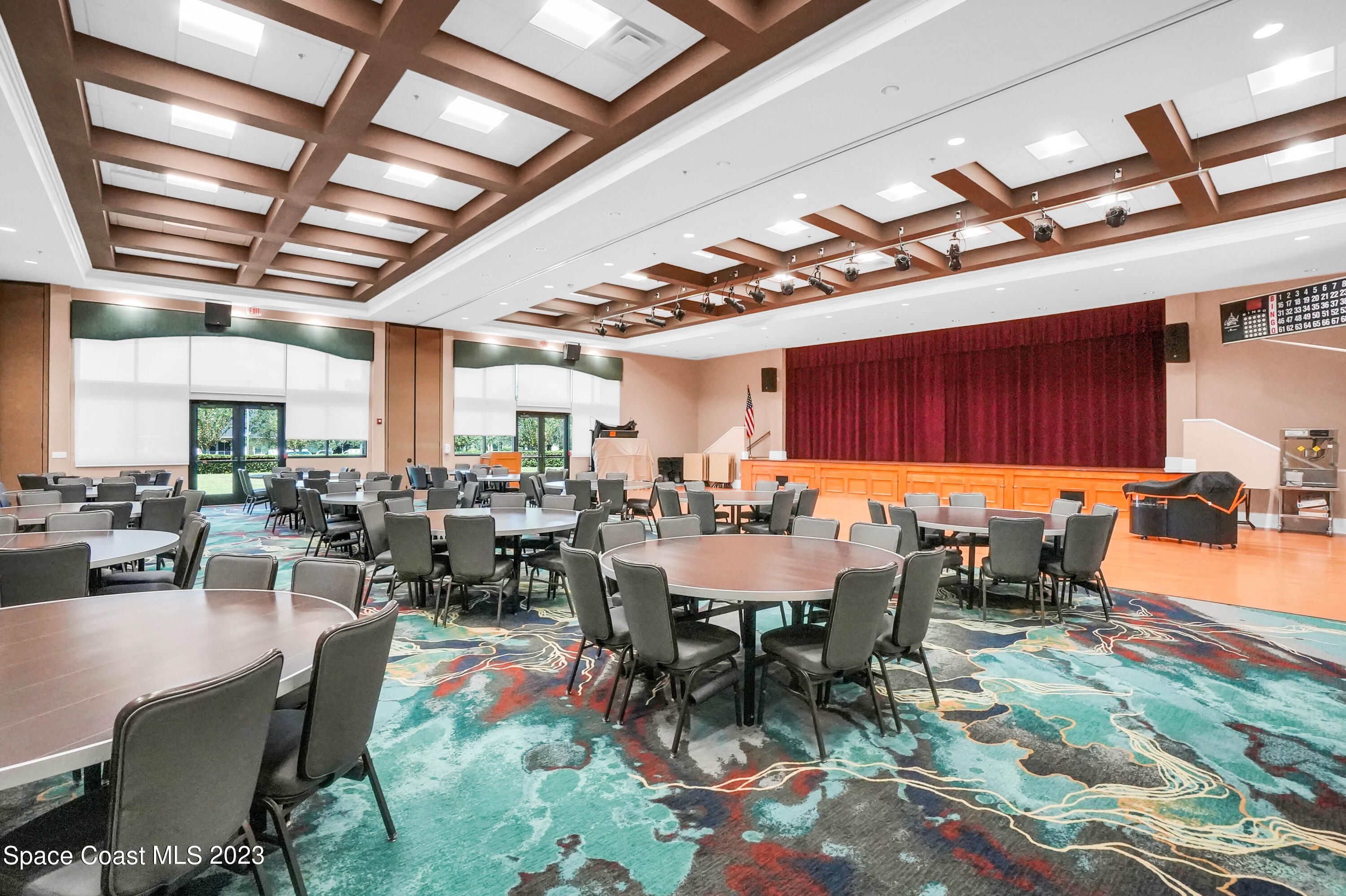5928 Van Ness Drive Melbourne, FL 32940 - Photo 30 of 35 a view of a dining room with lots of tables and chairs