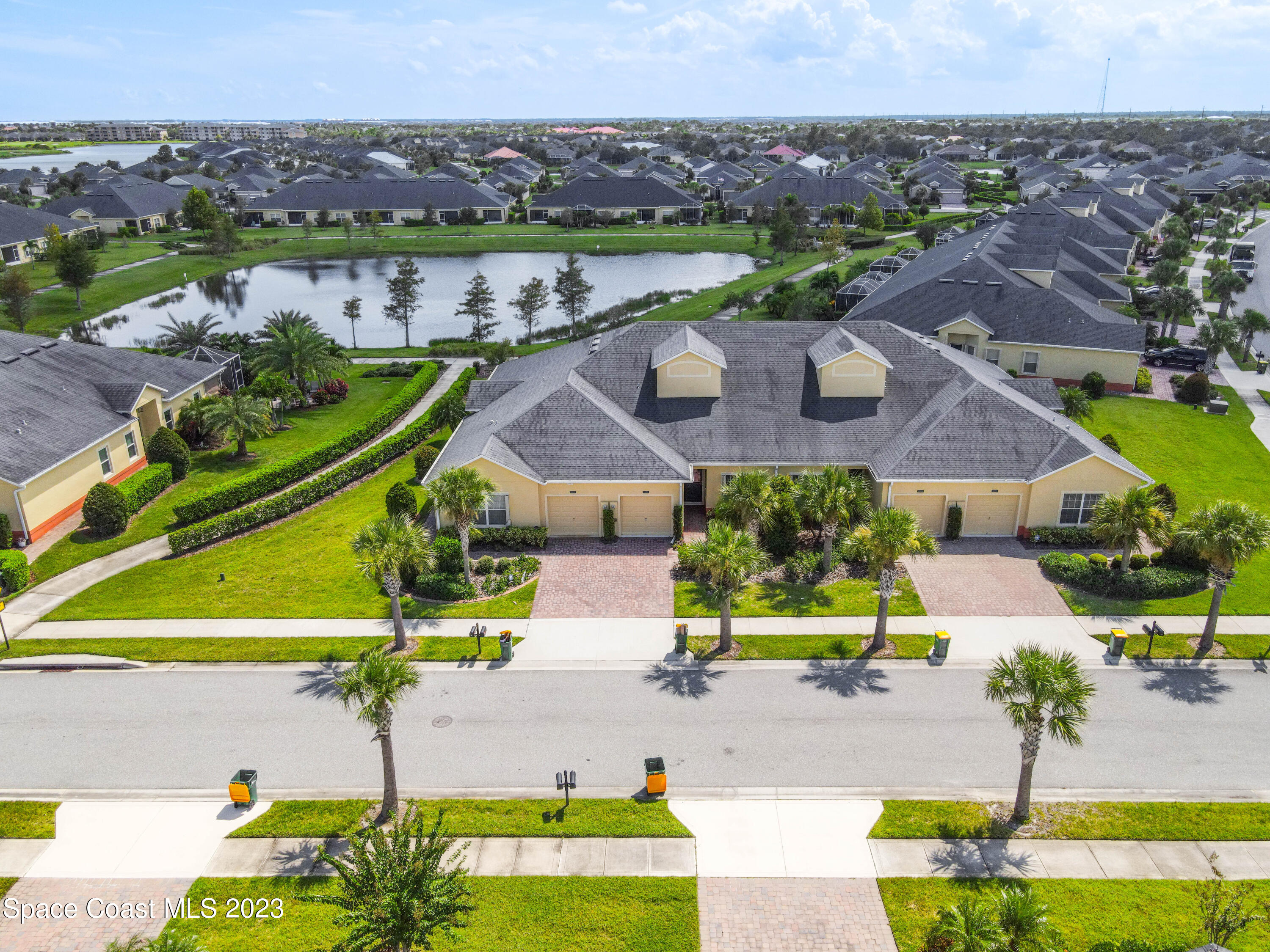 5928 Van Ness Drive Melbourne, FL 32940 - Photo 35 of 35 an aerial view of a house with a garden
