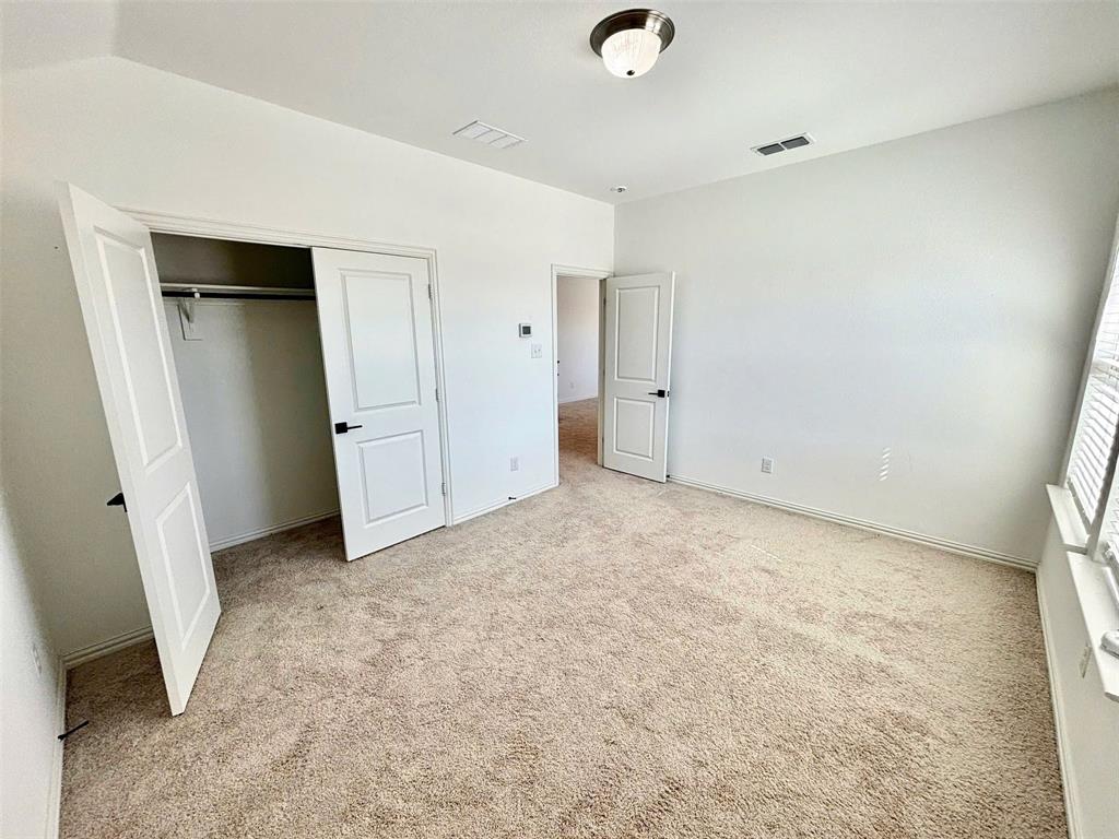 512 Virginia Way Princeton, TX 75407 - Photo 21 of 30 an empty room with closet