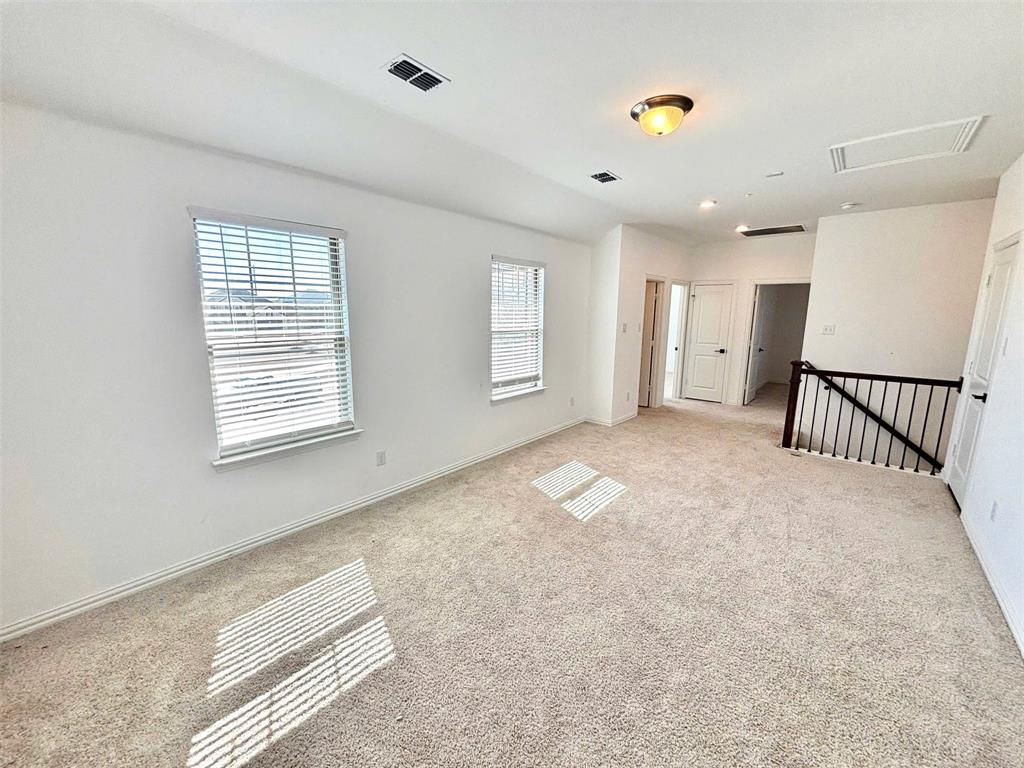 512 Virginia Way Princeton, TX 75407 - Photo 23 of 30 a view of an empty room with a window
