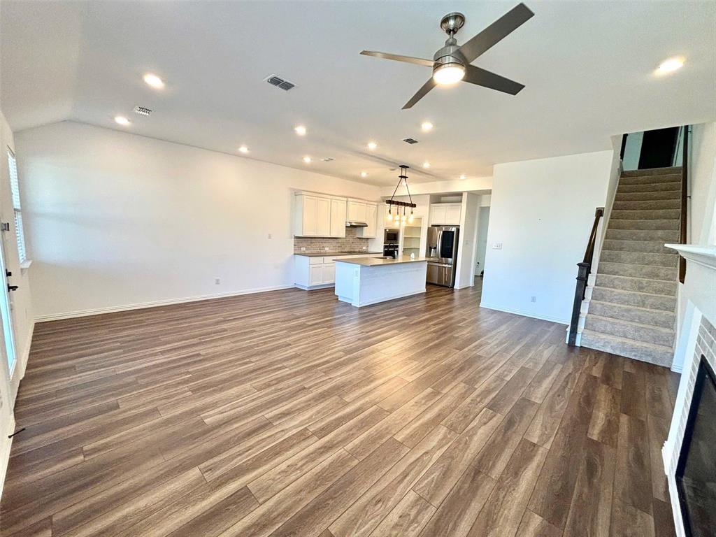 512 Virginia Way Princeton, TX 75407 - Photo 6 of 30 a view of a living room and wooden floor