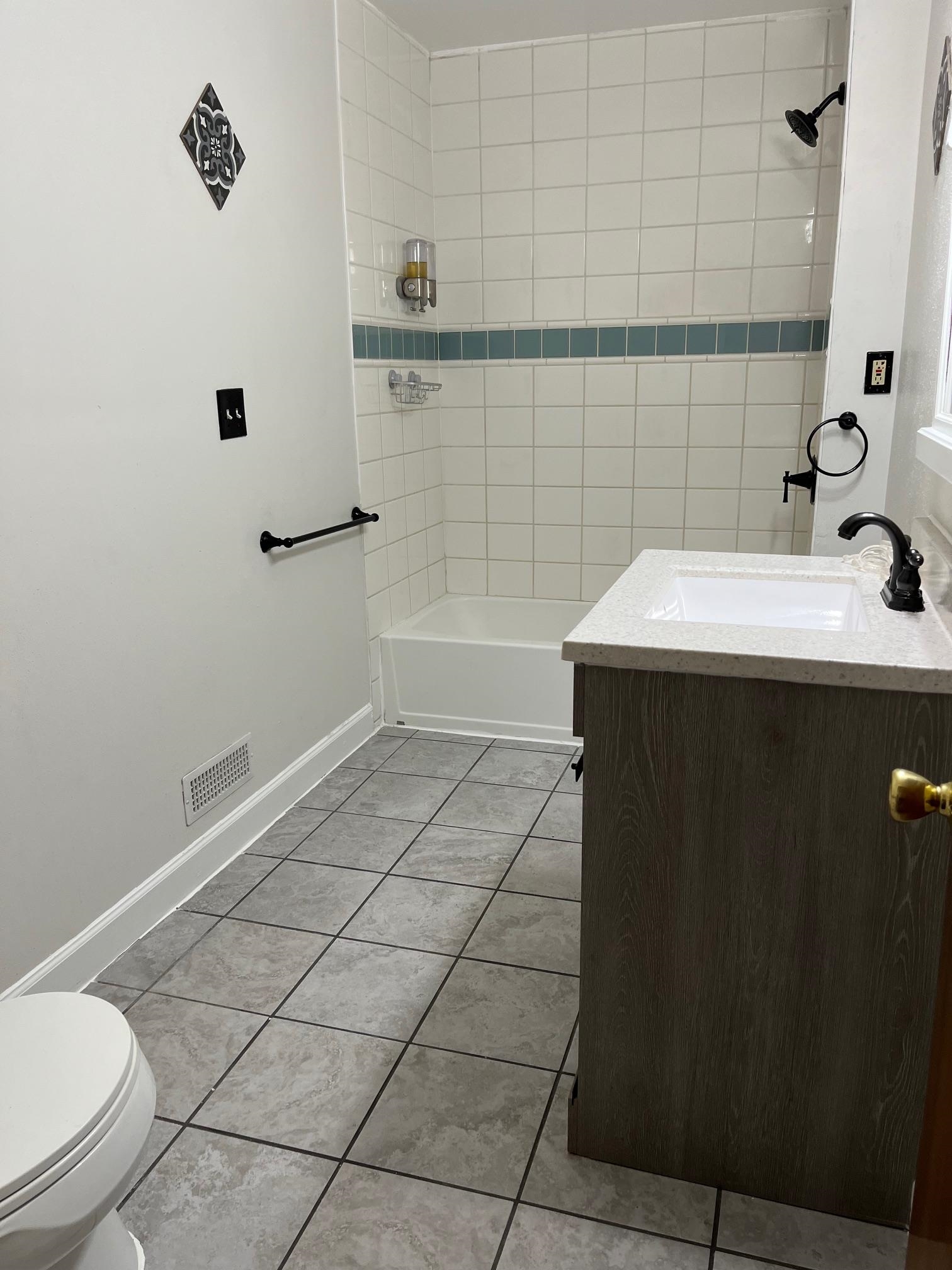 4909 Mohawk Road Rockford, IL 61107 - Photo 19 of 44 a bathroom with a sink and a toilet
