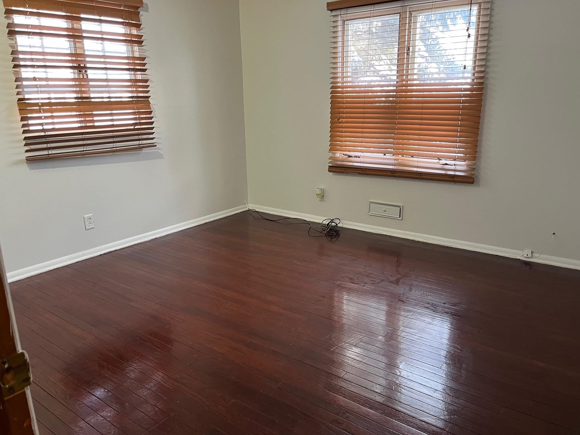 4909 Mohawk Road Rockford, IL 61107 - Photo 21 of 44 a view of empty room with wooden floor and a window