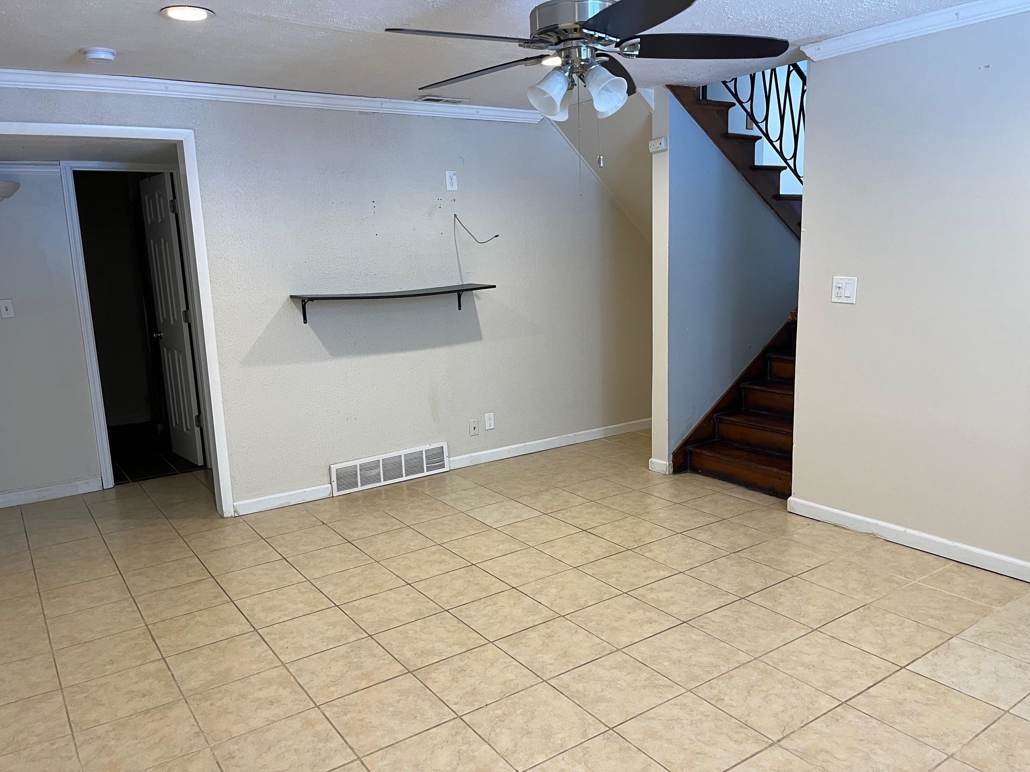 4909 Mohawk Road Rockford, IL 61107 - Photo 26 of 44 an empty room with staircase and mirror