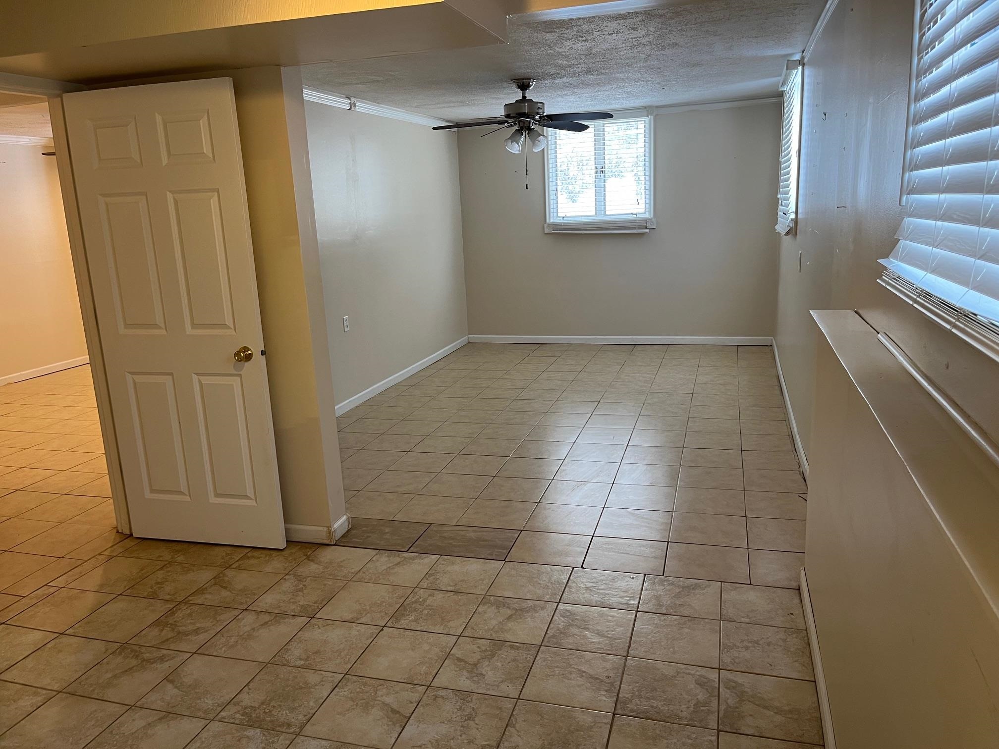 4909 Mohawk Road Rockford, IL 61107 - Photo 27 of 44 an empty room with windows and entrance