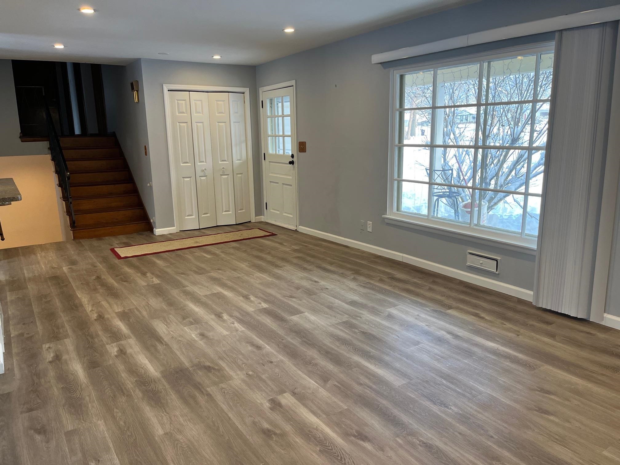 4909 Mohawk Road Rockford, IL 61107 - Photo 3 of 44 wooden floor in an empty room with a window