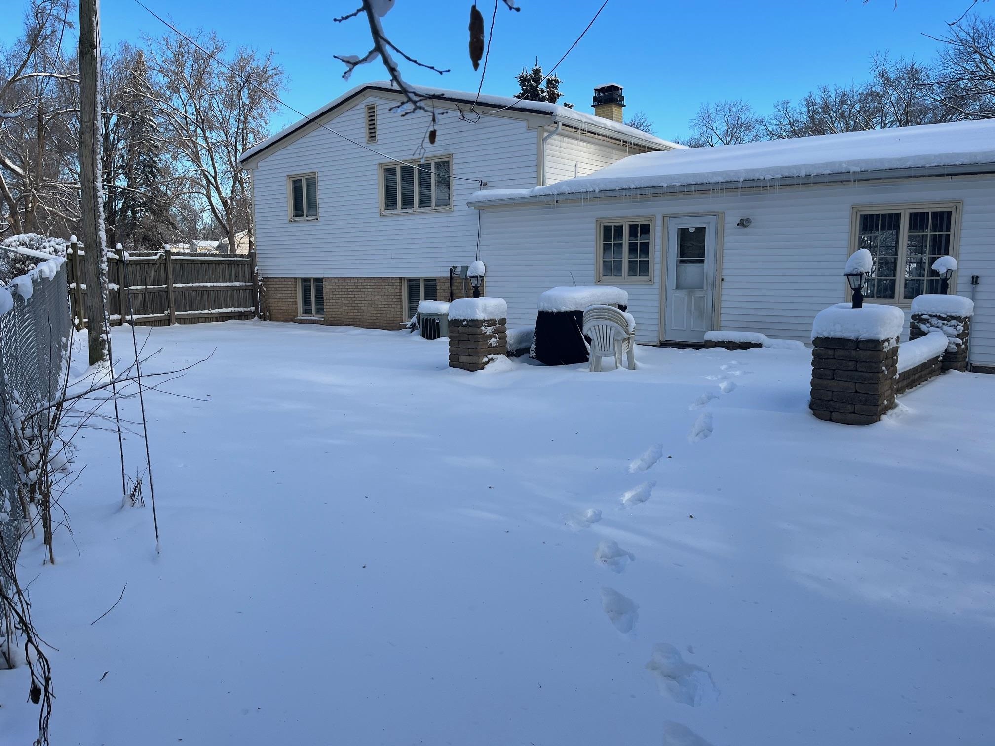 4909 Mohawk Road Rockford, IL 61107 - Photo 36 of 44 a view of a house with backyard and sitting area