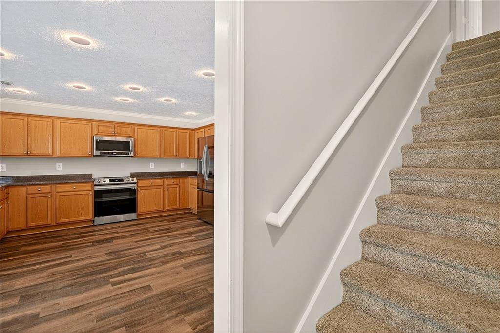 220 Windpher Ridge Hampton, GA 30228 - Photo 22 of 42 a view of kitchen with sink and refrigerator