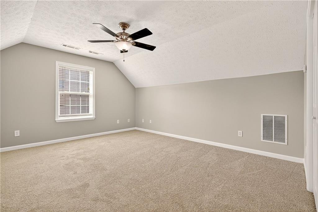 220 Windpher Ridge Hampton, GA 30228 - Photo 23 of 42 a view of an empty room with a window