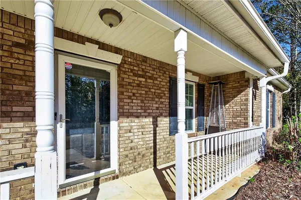 a porch with a glass door