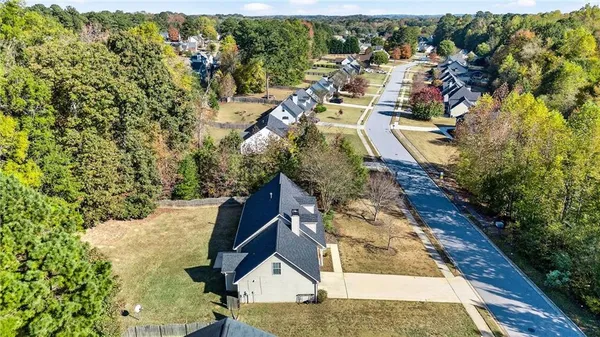 an aerial view of residential house with outdoor space