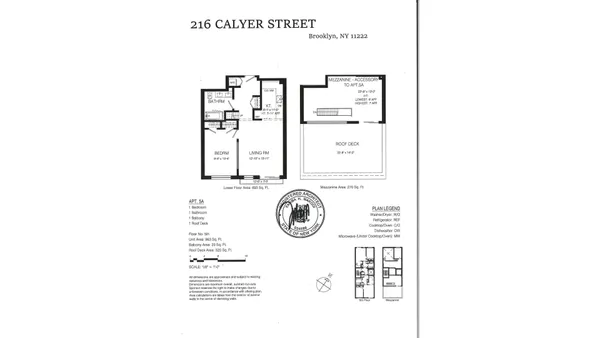 a living room with a couch and large windows