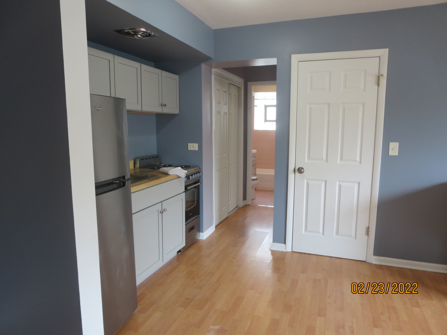720 North Western Avenue, Unit 5 Park Ridge, IL 60068 - Photo 6 of 9 a kitchen with a refrigerator and white cabinets